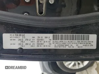 2015 Dodge Journey SXT with VIN 3C4PDDBG0FT660457, listed as a Copart auction lot 54582265 with 164,879 mi miles and Salvage title. Bid and sale history available at DreamBid. Image 13.