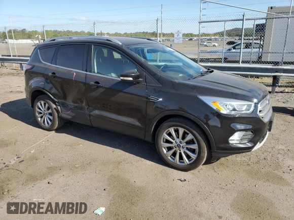2017 Ford Escape Titanium with VIN 1FMCU9JD3HUD63223, listed as a Copart auction lot 53370004 with 128,666 mi miles and Non Repairable. Bid and sale history available at carsss.com. Image 4.