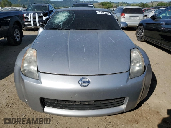 2003 Nissan 350Z Touring z VIN JN1AZ34E73T016672, wystawiony jako Copart lot #52968375 z przebiegiem 125 844 mil mil oraz Szkoda całkowita • Salvage title. Historia ofert i sprzedaży dostępna na DreamBid. Obrazek 5.