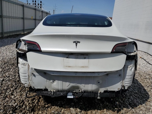2020 Tesla Model 3 Standard Range Plus with VIN 5YJ3E1EA5LF612626, listed as a Copart auction lot 54421235 with Not Provided miles and Clean Title. Bid and sale history available at DreamBid. Image 6.