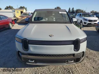 2023 Rivian R1S Adventure with VIN 7PDSGABA0PN005768, listed as a Copart auction lot 73223724 with 212 mi miles and Salvage Title. Bid and sale history available at carsss.com. Image 5.