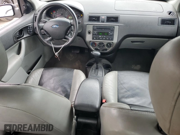 2007 Ford Focus S z VIN 1FAHP34N57W223198, wystawiony jako Copart lot #55725345 z przebiegiem 174 833 mil mil oraz Szkoda całkowita • Salvage title. Historia ofert i sprzedaży dostępna na DreamBid. Obrazek 8.