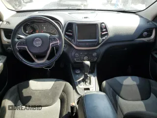 2014 Jeep Cherokee Altitude with VIN 1C4PJMCB0EW230724, listed as a Copart auction lot 49576945 with 133,392 mi miles and Salvage Title. Bid and sale history available at carsss.com. Image 8.
