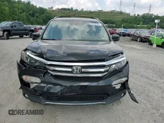 2017 Honda Pilot Touring with VIN 5FNYF6H96HB087634, listed as a Copart auction lot 63535125 with 137,129 mi miles and Salvage title. Bid and sale history available at DreamBid. Image 14.