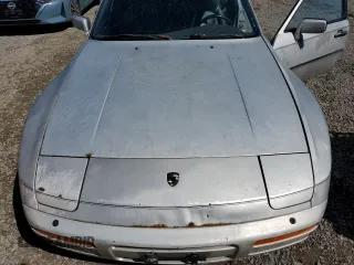 1986 Porsche 944 z VIN WP0AA0954GN155776, wystawiony jako Copart lot #56032785 z przebiegiem 17 696 mil mil oraz Szkoda całkowita • Salvage title. Historia ofert i sprzedaży dostępna na DreamBid. Obrazek 11.