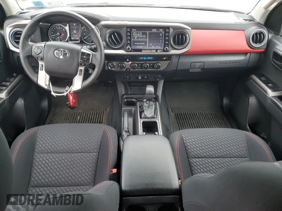 2023 Toyota Tacoma SR with VIN 3TMCZ5AN2PM642205, listed as a Copart auction lot 61045955 with 10,596 mi miles and Salvage title. Bid and sale history available at DreamBid. Image 8.