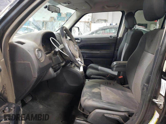 2014 Jeep Patriot Latitude with VIN 1C4NJRFB0ED588336, listed as a Copart auction lot 89391695 with 133,941 mi miles and Salvage Title. Bid and sale history available at carsss.com. Image 7.