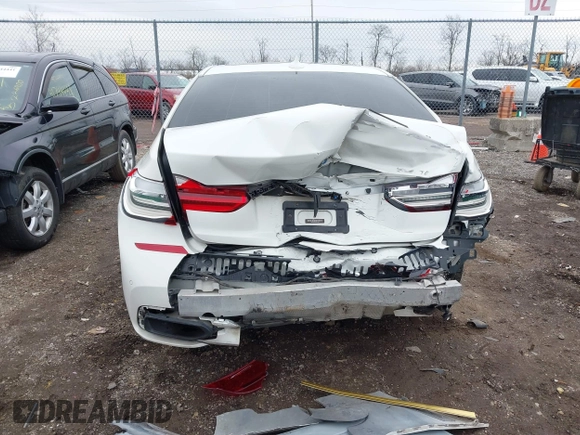 2016 BMW 7 Series 740i with VIN WBA7E2C50GG714647, listed as a IAAI auction lot 41745442 with 134,399 mi miles and . Bid and sale history available at carsss.com. Image 6.