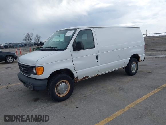 2004 Ford Econoline Cargo with VIN 1FTNE24W84HB38152, listed as a IAAI auction lot 42090193 with 102,357 mi miles. Bid and sale history available at carsss.com. Image 2.