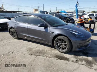 2023 Tesla Model 3 с VIN 5YJ3E1EA9PF402374, выставлен на аукционе Copart как лот 51184075 с пробегом 31 375 миль миль и Списание • Salvage title. История ставок и продаж доступна на DreamBid. Изображение 4.