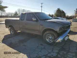 2001 Ford F-150 XL with VIN 1FTRX18L11NA45878, listed as a Copart auction lot 44269355 with 0 mi miles and Salvage Title. Bid and sale history available at carsss.com. Image 4.
