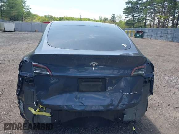 2020 Tesla Model Y Long Range with VIN 5YJYGDEE2LF029385, listed as a IAAI auction lot 42164786 with 58,685 mi miles and . Bid and sale history available at DreamBid. Image 16.