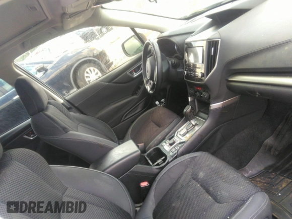 2021 Subaru Forester Premium with VIN JF2SKAFC1MH437721, listed as a IAAI auction lot 42633556 with 119,574 mi miles and . Bid and sale history available at DreamBid. Image 5.