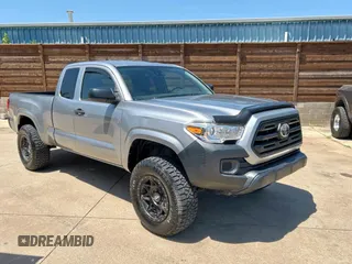 2019 Toyota Tacoma SR with VIN 5TFRX5GNXKX153724, listed as a Copart auction lot 66334885 with 96,857 mi miles and Clean title. Bid and sale history available at DreamBid. Image 1.