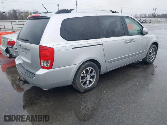 2014 Kia Sedona EX with VIN KNDMH4C76E6541200, listed as a IAAI auction lot 41657002 with 141,377 mi miles. Bid and sale history available at carsss.com. Image 4.