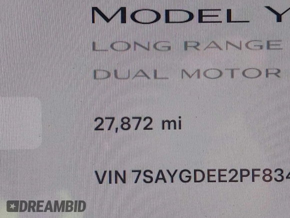 2023 Tesla Model Y Long Range z VIN 7SAYGDEE2PF834036, wystawiony jako IAAI lot #41933120 z przebiegiem 27 872 mil mil oraz . Historia ofert i sprzedaży dostępna na DreamBid. Obrazek 16.