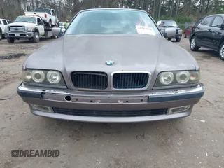 1998 BMW 7 Series 740il with VIN WBAGJ8323WDM23239, listed as a IAAI auction lot 41512630 with 221,673 mi miles. Bid and sale history available at carsss.com. Image 6.