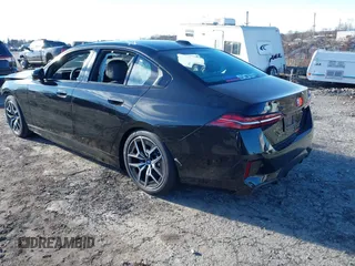 2024 BMW i5 eDrive40 with VIN WBY33FK00RCP37858, listed as a IAAI auction lot 41016747 with Not provided miles and . Bid and sale history available at DreamBid. Image 3.