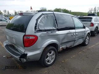 2005 Dodge Caravan SXT with VIN 1D4GP45R35B203472, listed as a IAAI auction lot 42198565 with 145,598 mi miles and . Bid and sale history available at carsss.com. Image 4.