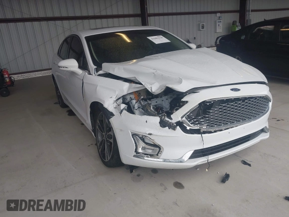 2019 Ford Fusion Titanium with VIN 3FA6P0K95KR271291, listed as a IAAI auction lot 41983320 with 71,962 mi miles and . Bid and sale history available at DreamBid. Image 1.