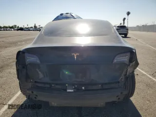 2018 Tesla Model 3 Long Range Battery z VIN 5YJ3E1EA8JF123005, wystawiony jako Copart lot #57272825 z przebiegiem 170 951 mil mil oraz Szkoda całkowita • Salvage title. Historia ofert i sprzedaży dostępna na DreamBid. Obrazek 6.