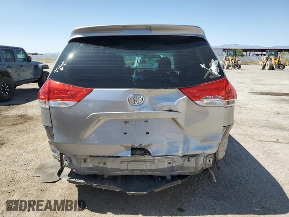2012 Toyota Sienna with VIN 5TDZK3DC8CS246285, listed as a Copart auction lot 61676185 with 114,700 mi miles and Salvage title. Bid and sale history available at DreamBid. Image 6.