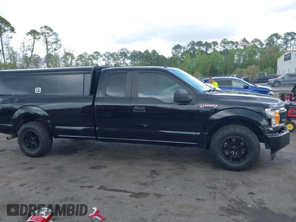 2018 Ford F-150 XL with VIN 1FTEX1CP9JKD23856, listed as a IAAI auction lot 41929088 with 62,747 mi miles and . Bid and sale history available at DreamBid. Image 13.
