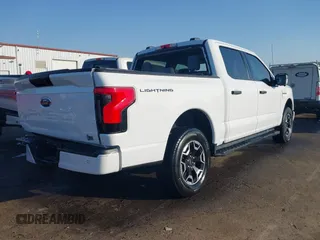 2023 Ford F-150 Lightning Pro with VIN 1FTVW1EL6PWG34059, listed as a IAAI auction lot 42010900 with 20,759 mi miles and . Bid and sale history available at DreamBid. Image 4.