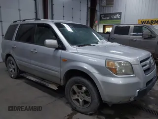 2007 Honda Pilot EX-L with VIN 2HKYF18607H511219, listed as a IAAI auction lot 41368619 with 270,722 mi miles and . Bid and sale history available at DreamBid. Image 6.