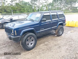 2001 Jeep Cherokee Sport with VIN 1J4FT48S71L525856, listed as a IAAI auction lot 42349383 with 218,122 mi miles and . Bid and sale history available at DreamBid. Image 2.