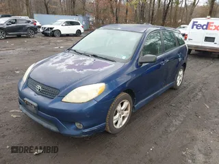 2006 Toyota Matrix STD with VIN 2T1KR32E26C596932, listed as a IAAI auction lot 41706466 with 241,246 mi miles. Bid and sale history available at carsss.com. Image 2.