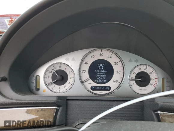 2005 Mercedes-Benz E 5.0L with VIN WDBUF70J45A645154, listed as a Copart auction lot 82883524 with 134,088 mi miles and Salvage Title. Bid and sale history available at carsss.com. Image 9.