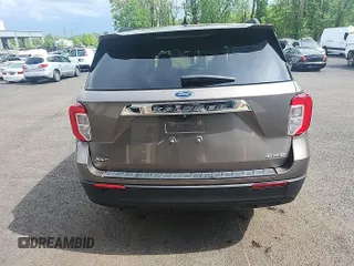 2021 Ford Explorer XLT z VIN 1FMSK8DHXMGB35691, wystawiony jako IAAI lot #42418719 z przebiegiem 64 847 mil mil oraz . Historia ofert i sprzedaży dostępna na DreamBid. Obrazek 10.