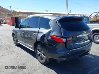 2013 Infiniti JX35 with VIN 5N1AL0MM8DC317601, listed as a IAAI auction lot 40678694 with 142,221 mi miles and . Bid and sale history available at DreamBid. Image 3.