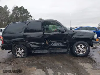 2003 Chevrolet Tahoe LS with VIN 1GNEC13Z73R243308, listed as a IAAI auction lot 41510266 with 246,378 mi miles. Bid and sale history available at carsss.com. Image 13.