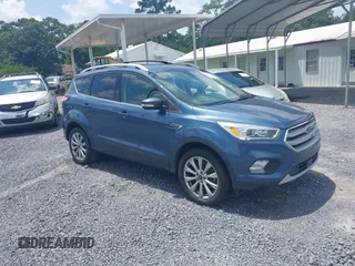 2018 Ford Escape Titanium z VIN 1FMCU0J9XJUC44694, wystawiony jako IAAI lot #42727096 z przebiegiem 179 757 mil mil oraz . Historia ofert i sprzedaży dostępna na DreamBid. Obrazek 1.