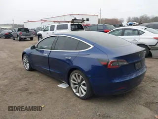 2019 Tesla Model 3 Long Range with VIN 5YJ3E1EB9KF454007, listed as a IAAI auction lot 41769346 with 141,609 mi miles. Bid and sale history available at carsss.com. Image 3.