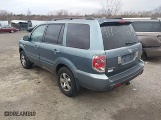 2006 Honda Pilot EX-L with RES with VIN 2HKYF18646H555514, listed as a IAAI auction lot 41703223 with 292,487 mi miles. Bid and sale history available at carsss.com. Image 3.