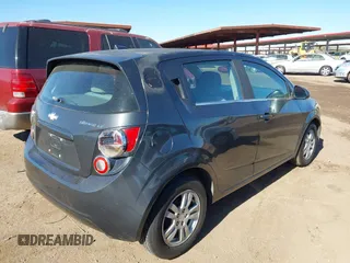 2014 Chevrolet Sonic LT with VIN 1G1JC6SH1E4111523, listed as a IAAI auction lot 41693815 with 147,353 mi miles. Bid and sale history available at carsss.com. Image 4.