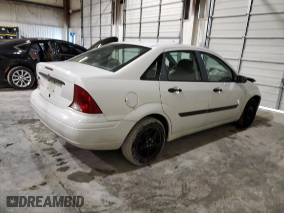 2002 Ford Focus LX with VIN 1FAFP33P52W126344, listed as a Copart auction lot 49757324 with 140,612 mi miles and Salvage Title. Bid and sale history available at DreamBid. Image 3.