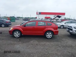 2009 Dodge Caliber SXT z VIN 1B3HB48A79D171465, wystawiony jako IAAI lot #42137493 z przebiegiem 161 046 mil mil oraz . Historia ofert i sprzedaży dostępna na DreamBid. Obrazek 14.