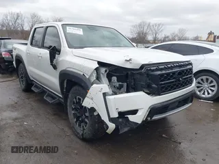 2022 Nissan Frontier SV z VIN 1N6ED1EJ2NN646035, wystawiony jako IAAI lot #41702459 z przebiegiem 93 030 mil mil oraz . Historia ofert i sprzedaży dostępna na DreamBid. Obrazek 1.