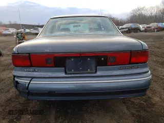 1992 Mercury Sable GS z VIN 1MELM50U9NA635171, wystawiony jako Copart lot #88474985 z przebiegiem 72 990 mil mil oraz Szkody całkowita. Historia ofert i sprzedaży dostępna na DreamBid. Obrazek 6.