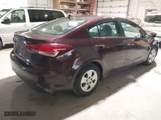 2017 Kia Forte LX with VIN 3KPFK4A78HE129551, listed as a IAAI auction lot 41926331 with 124,285 mi miles. Bid and sale history available at carsss.com. Image 4.