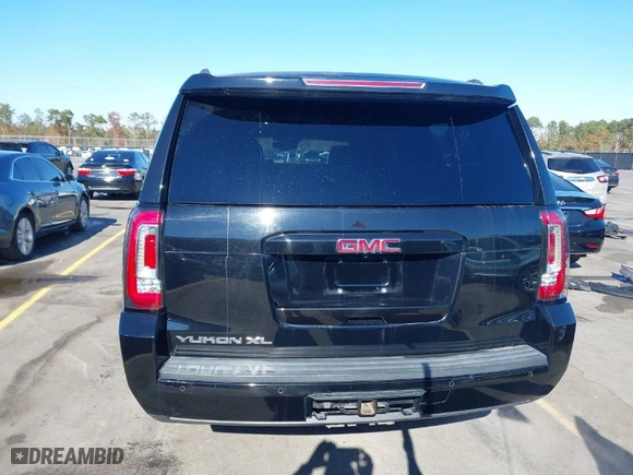 2017 GMC Yukon XL SLT with VIN 1GKS1GKCXHR255241, listed as a IAAI auction lot 40993149 with 173,130 mi miles. Bid and sale history available at carsss.com. Image 16.