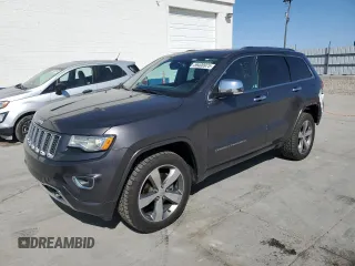 2015 Jeep Grand Cherokee Overland with VIN 1C4RJFCG8FC778764, listed as a Copart auction lot 59400975 with 121,877 mi miles and Salvage title. Bid and sale history available at DreamBid. Image 1.