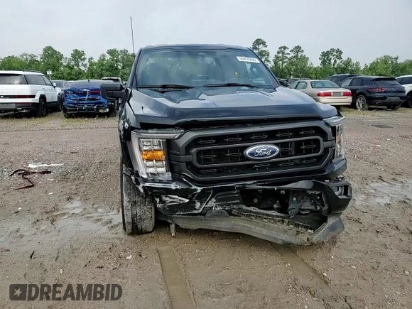 2023 Ford F-150 XL with VIN 1FTEW1C59PFC27499, listed as a Copart auction lot 54453255 with 58,554 mi miles and Salvage title. Bid and sale history available at DreamBid. Image 13.