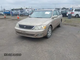 2001 Toyota Avalon XL w/Bucket Seats with VIN 4T1BF28B91U173868, listed as a IAAI auction lot 41721904 with 325,097 mi miles. Bid and sale history available at carsss.com. Image 17.