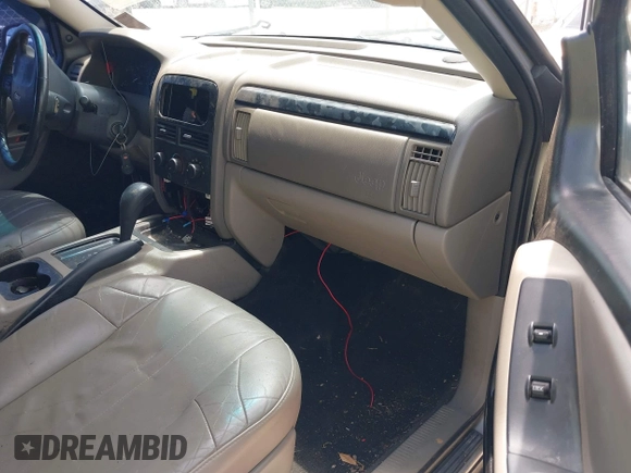 2002 Jeep Grand Cherokee Laredo with VIN 1J4GX48S32C288387, listed as a IAAI auction lot 42212249 with 151,028 mi miles and . Bid and sale history available at DreamBid. Image 5.