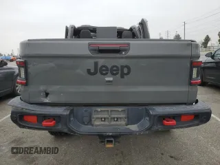 2020 Jeep Gladiator Sport S z VIN 1C6HJTAG6LL193553, wystawiony jako Copart lot #55638915 z przebiegiem 84 600 mil mil oraz Szkoda całkowita • Salvage title. Historia ofert i sprzedaży dostępna na DreamBid. Obrazek 6.